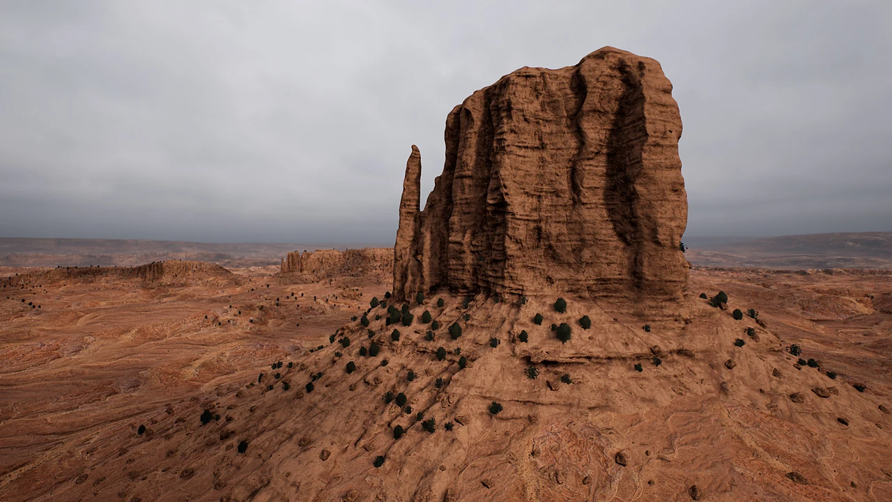 A towering desert butte under grey skies